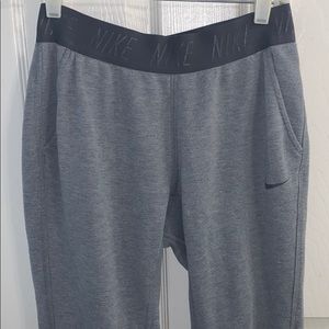 gray nike sweatpants with elastic waistband.